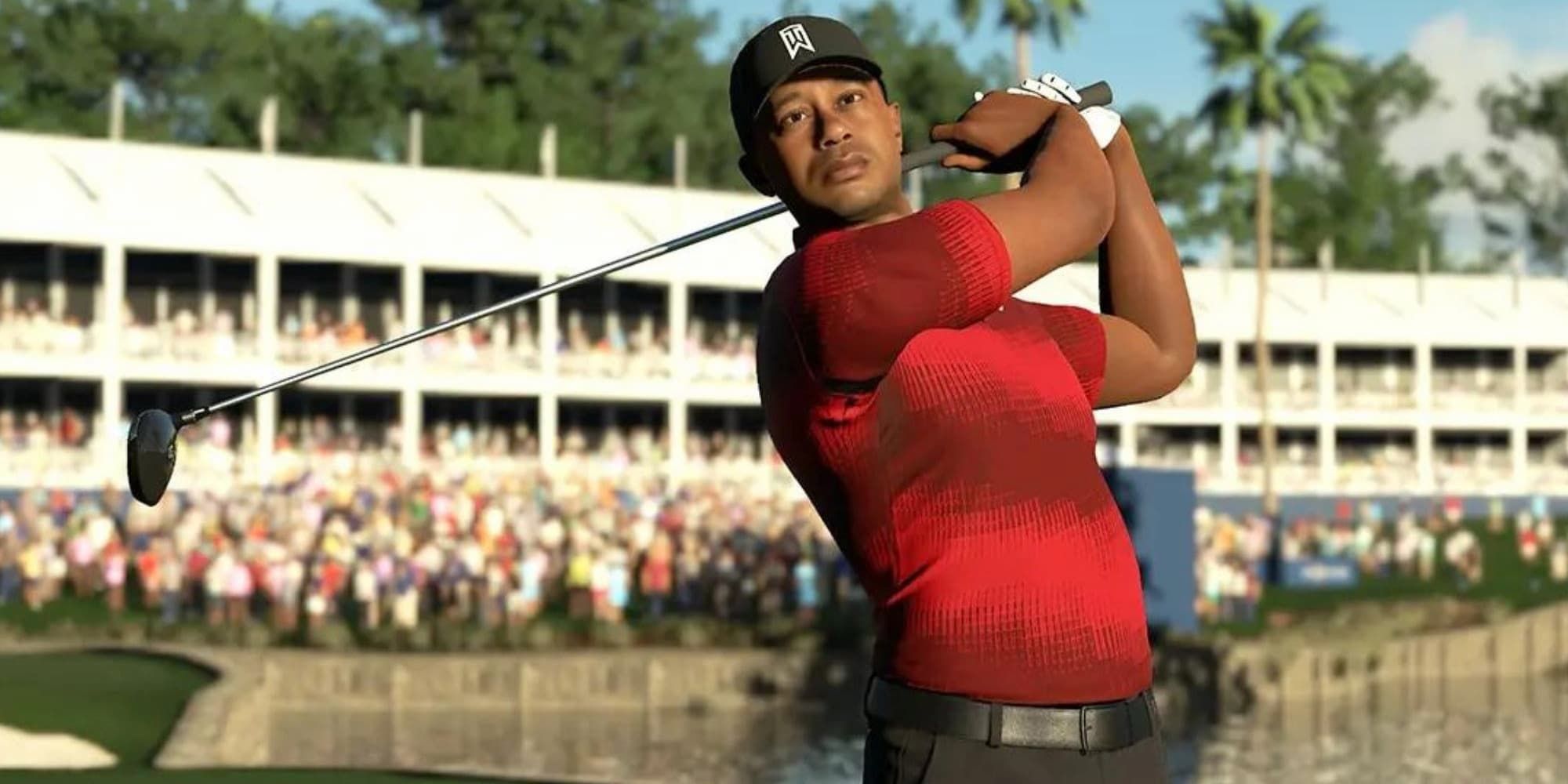 Tiger Woods follows through after a big swing of his golf club.
