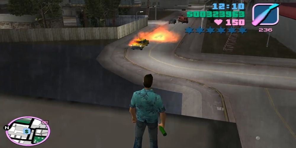 Tommy watches an explosion with a Molotov cocktail in his hand in Grand Theft Auto Vice City