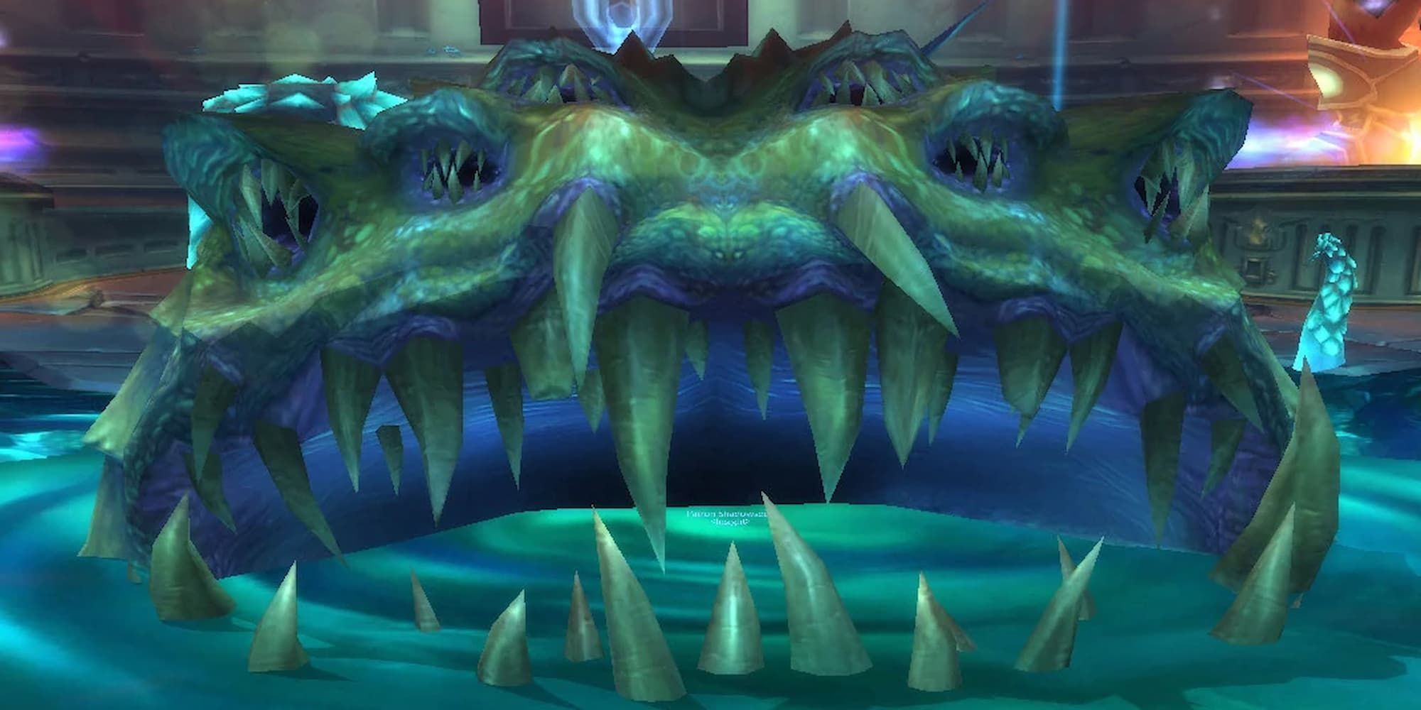 Yogg-Saron rests in his pool, teeth showing, ready to attack.