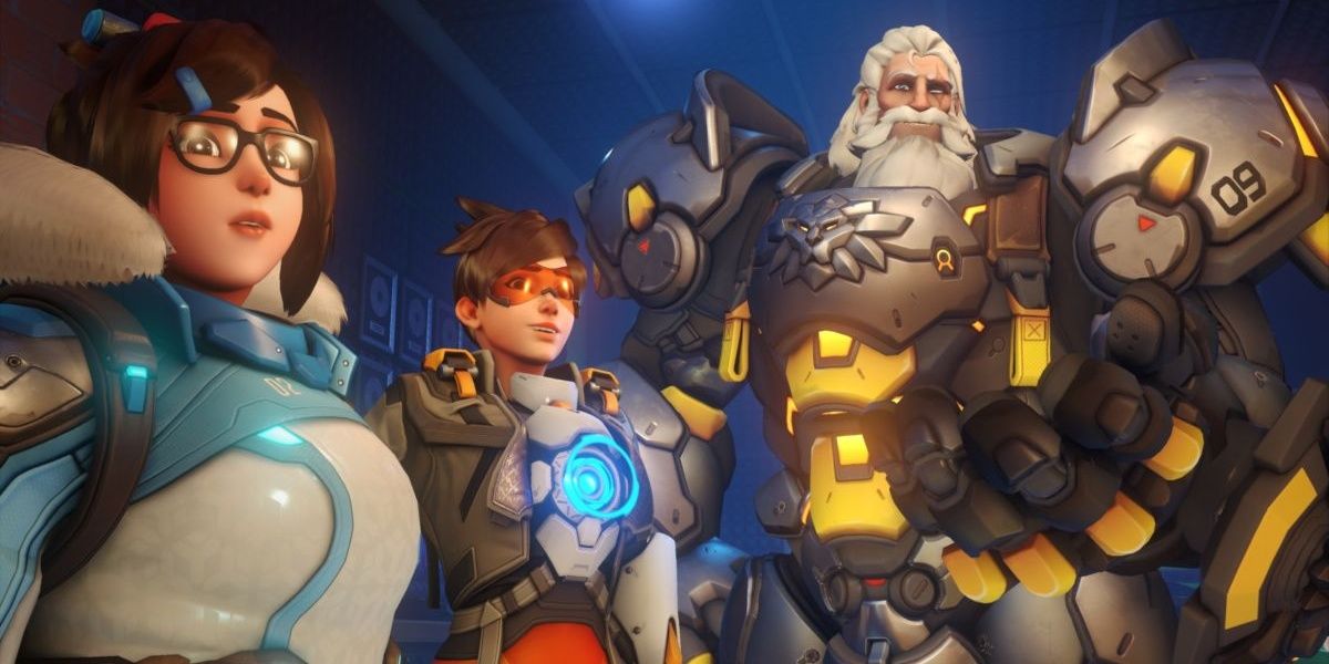three heroes from overwatch look off in the distance
