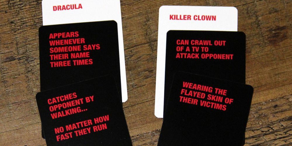 An example of a card battle from Superfight featuring Dracula versus a Killer Clown.