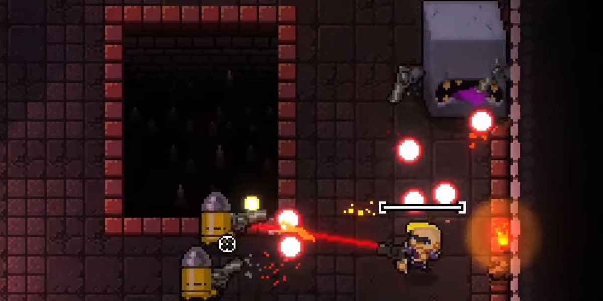 A Wall Mimic attacks the Convict in Enter the Gungeon