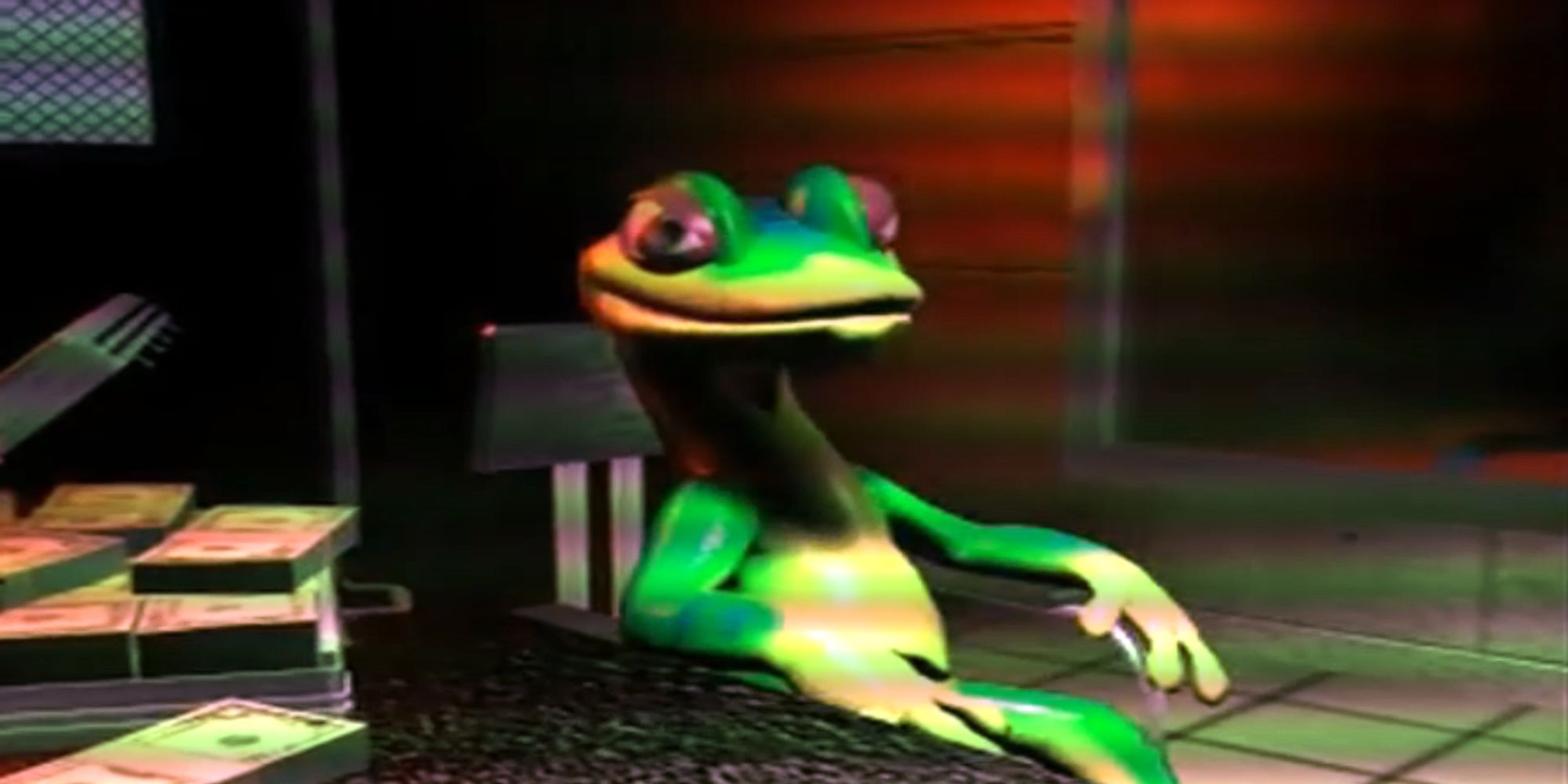 Gex sits in an interrogation room with an open suitcase full of money on the table to his right