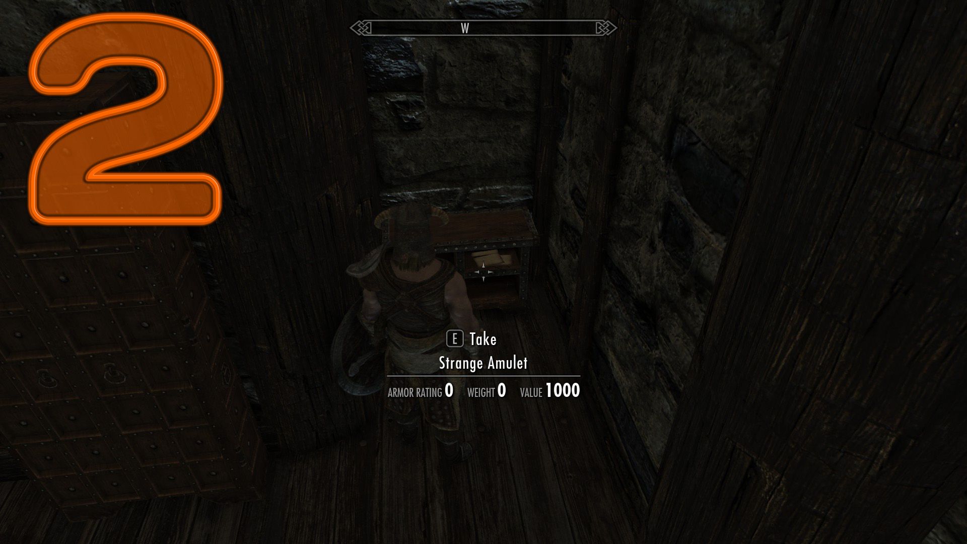 An annotated screenshot showing the location of an amulet in an abandoned house