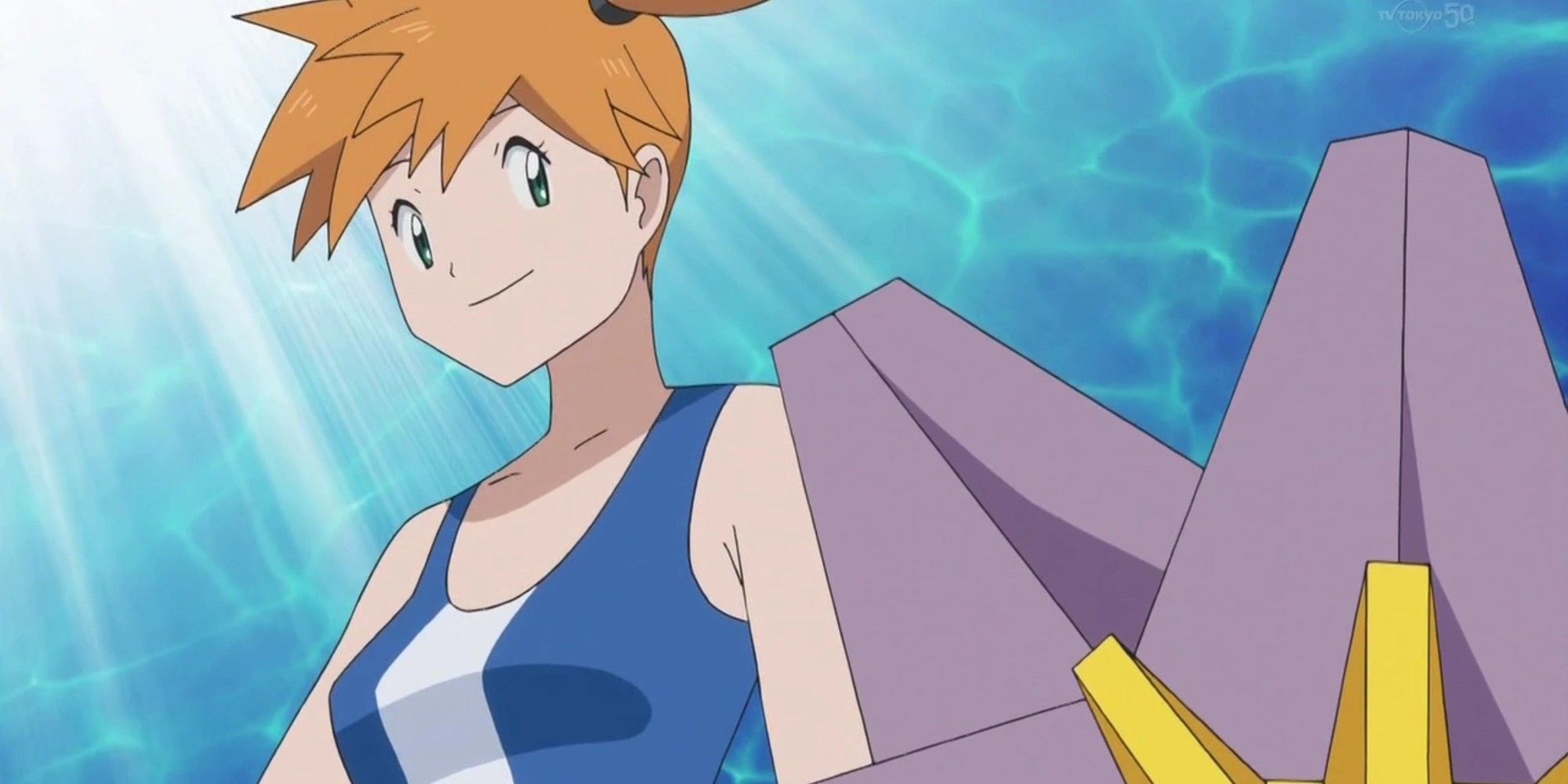 Misty from the Pokemon anime with Starmie looking confident