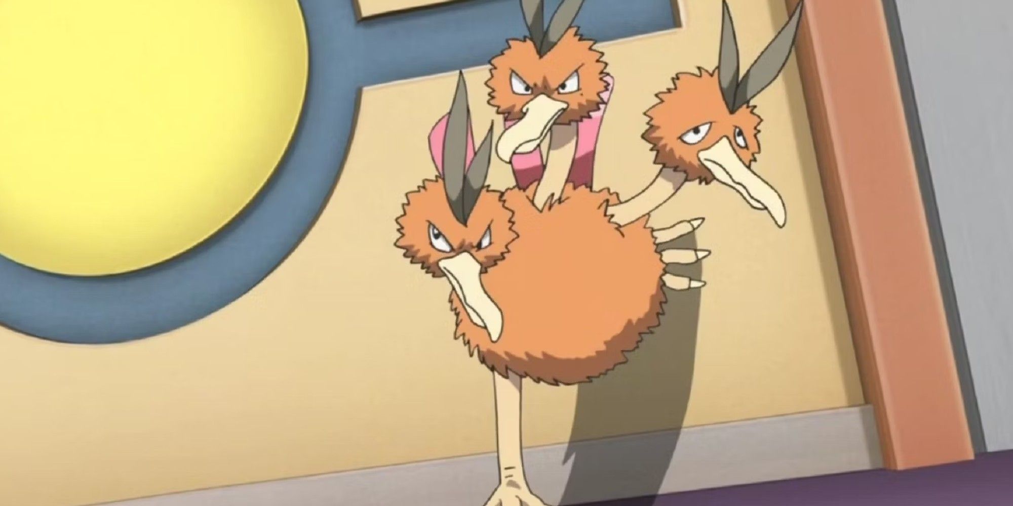 Dodrio from the Pokemon anime, with one foot on the wall, ready to attack