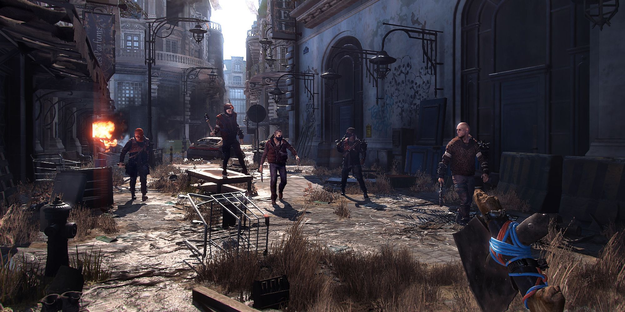 Characters walking through abandoned city Dying Light 2