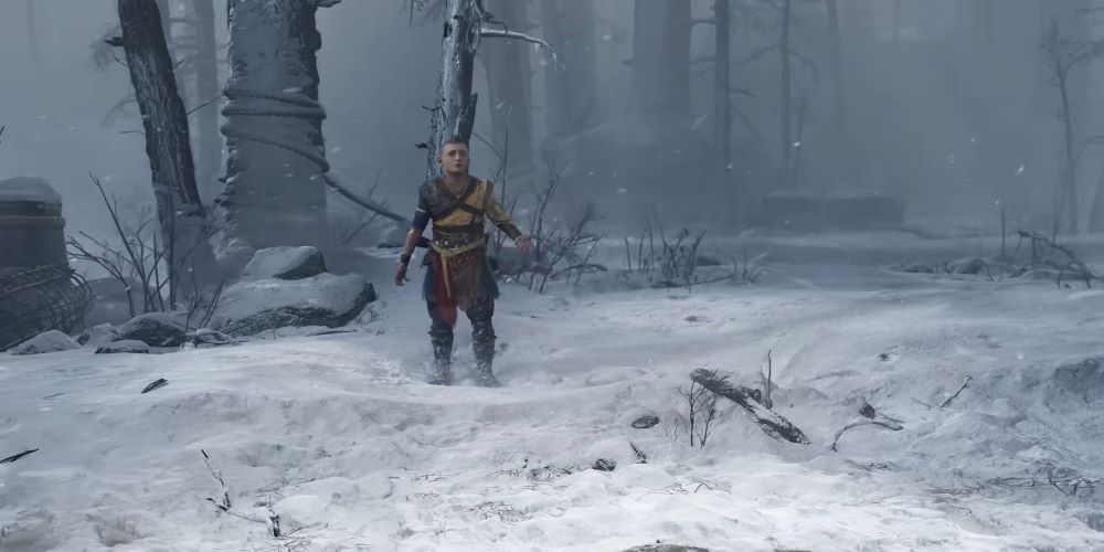 Atreus arguing with Kratos (off screen) in a snowy forest.