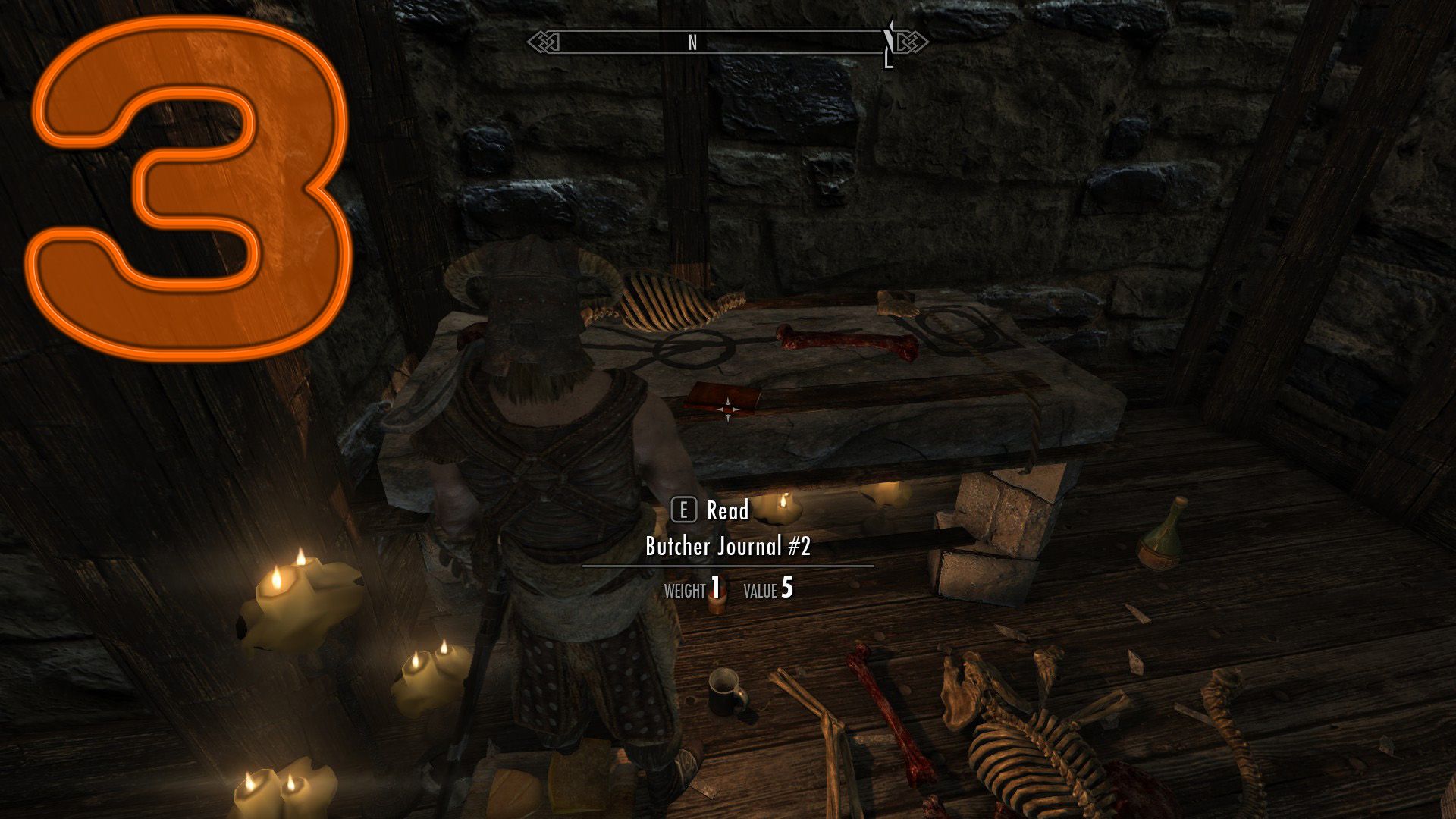 An annotated screenshot showing where to find a journal hidden amid blood and gristle.