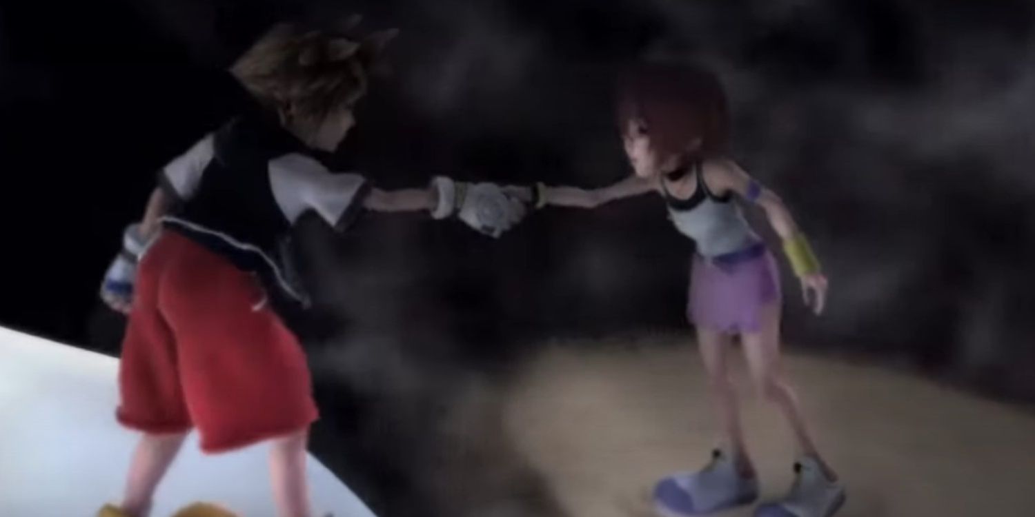 Sora and Kairi hold hands across the darkness at the end of Kingdom Hearts.