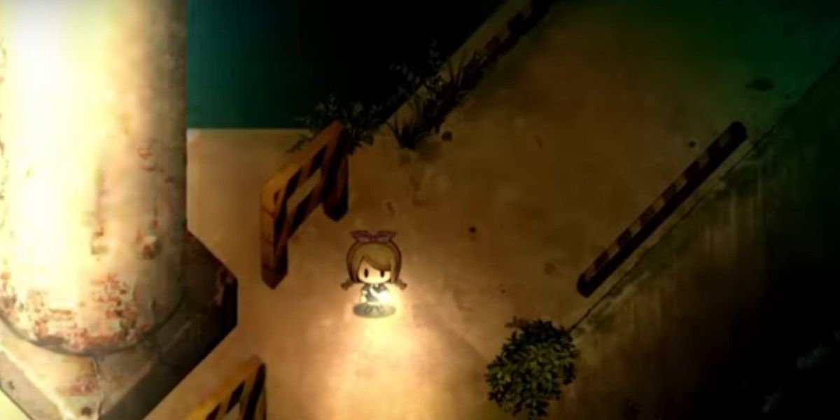 Yuzu outside the lighthouse in Yomawari: Lost in the Dark.