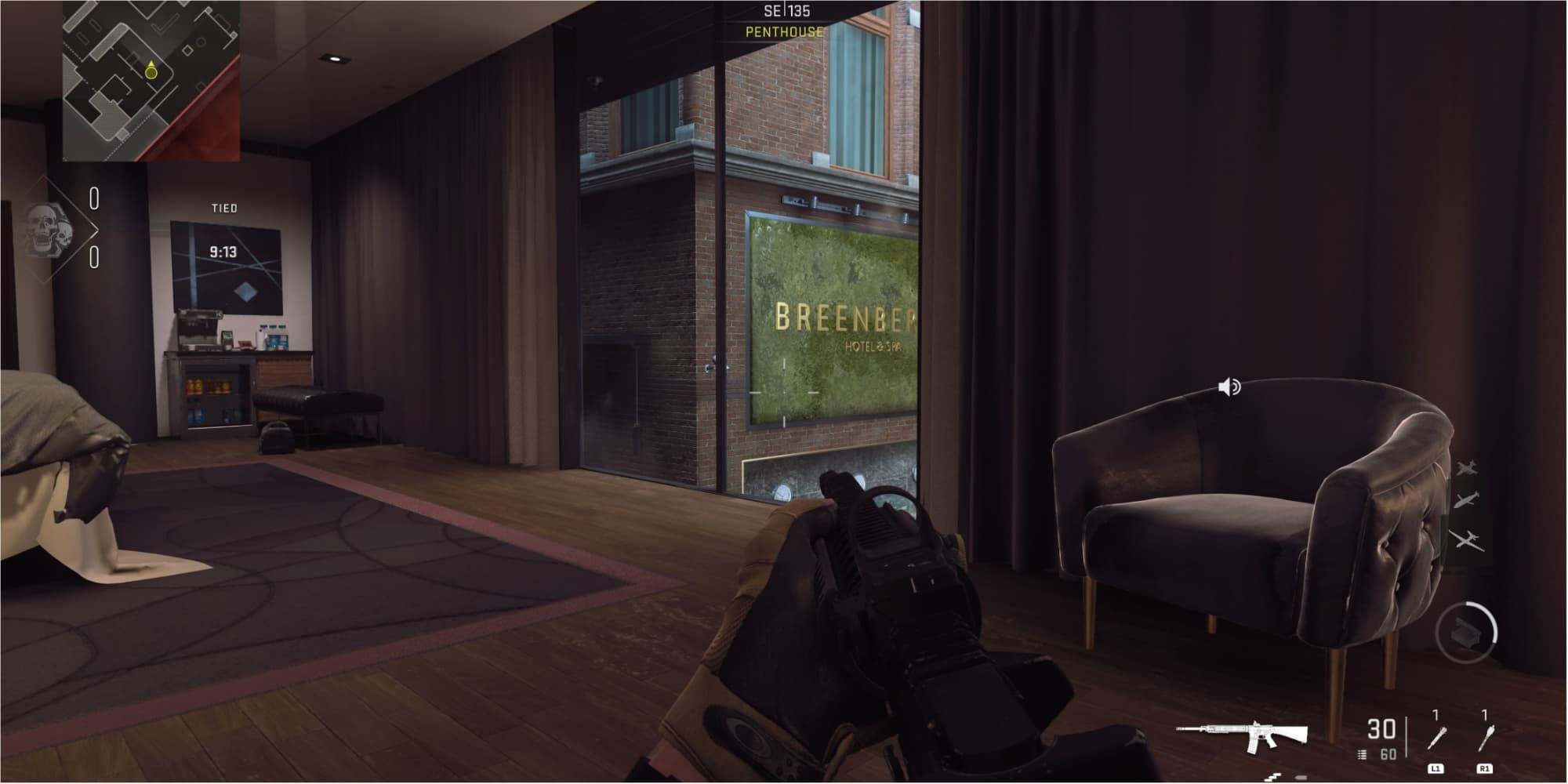 The player peeks out of the window in the Penthouse area of the Breenbergh Hotel map in Call of Duty: Modern Warfare 2