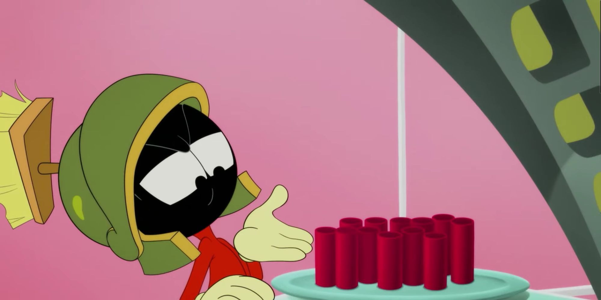 Marvin the Martian looking at a plate of dynamite.