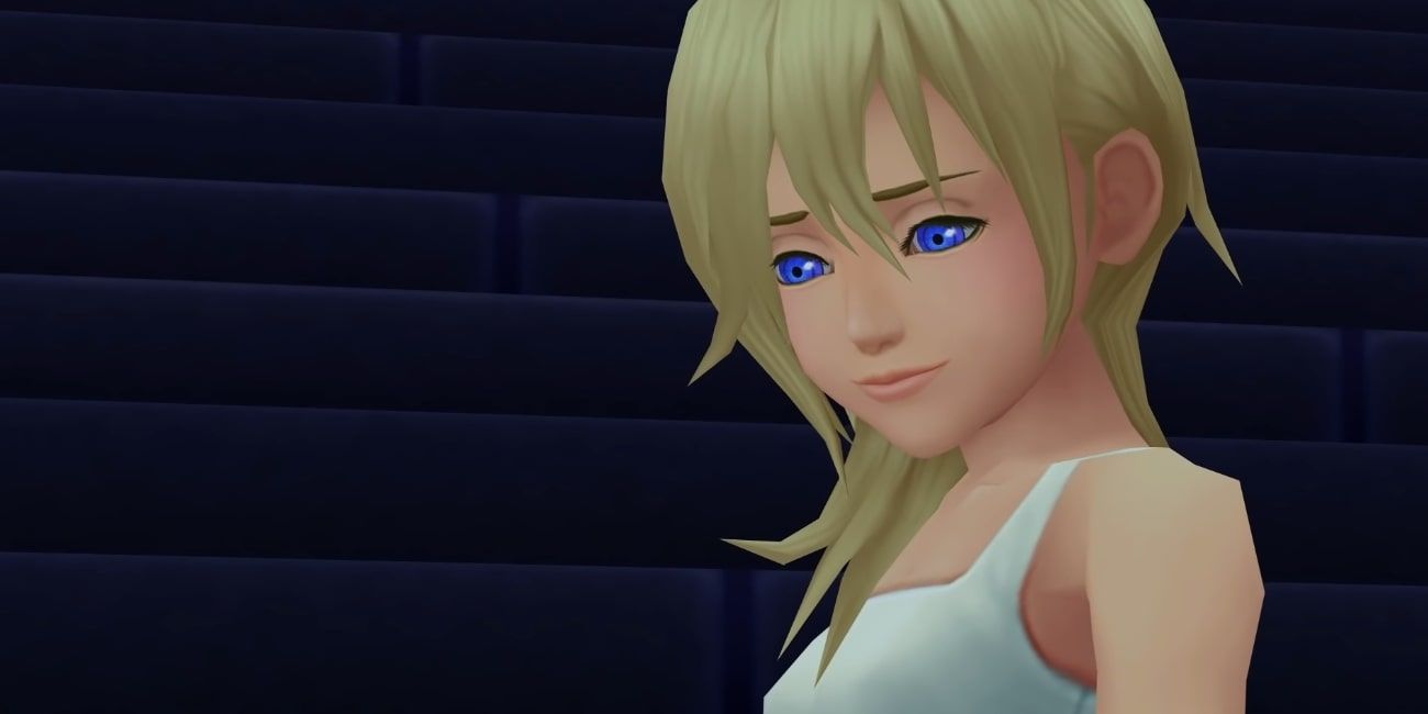 Namine from Kingdom Hearts looking down sadly.