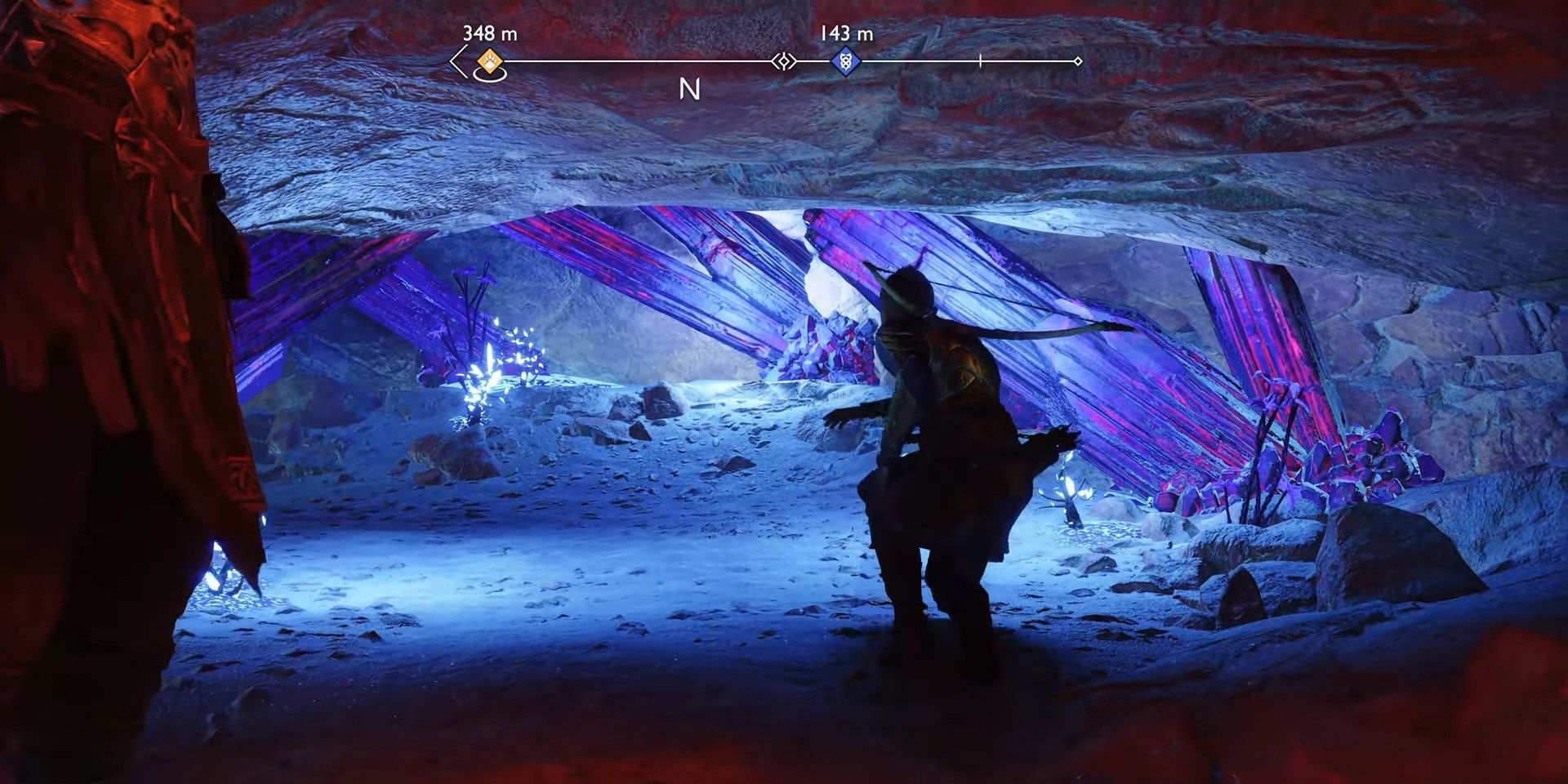 Kratos and Atreus traversing through a beautiful crystalline tunnel in The Below during the Secret of the Sands mission. 