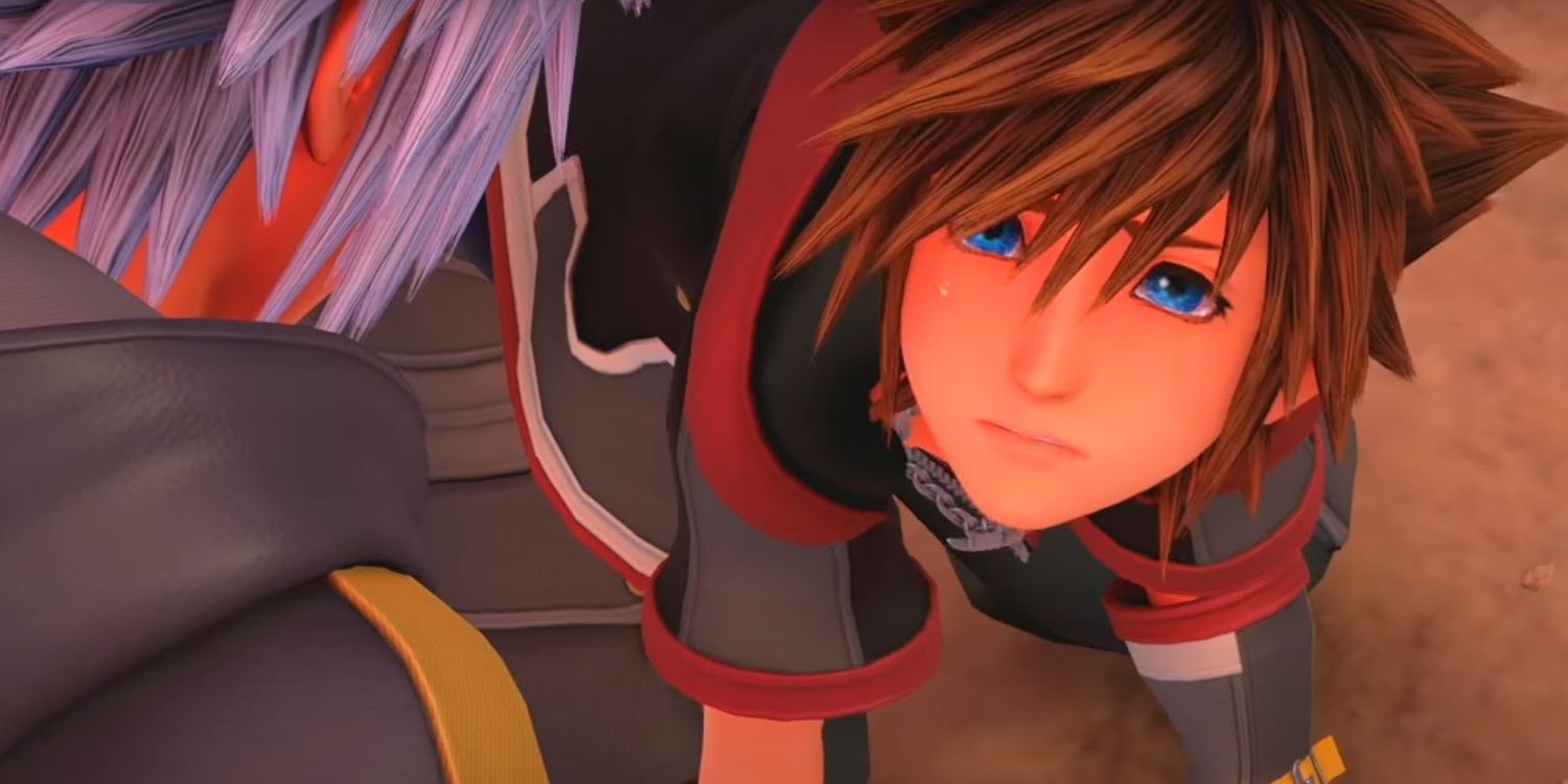 Sora looks up to Riku, crying, in Kingdom Hearts 3.