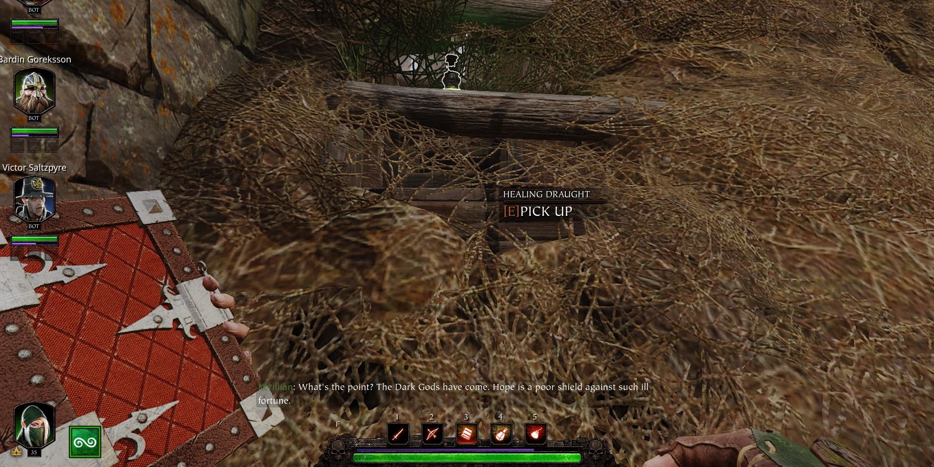 The player holding a tome in Vermintide 2.