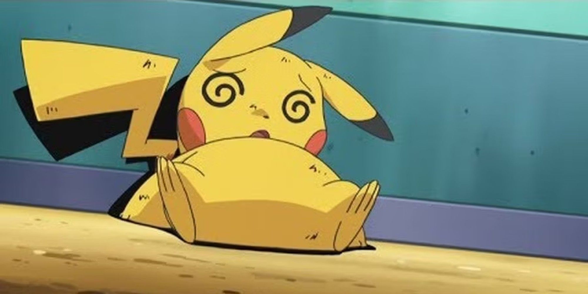 Pikachu from the anime, fainted in a stadium.