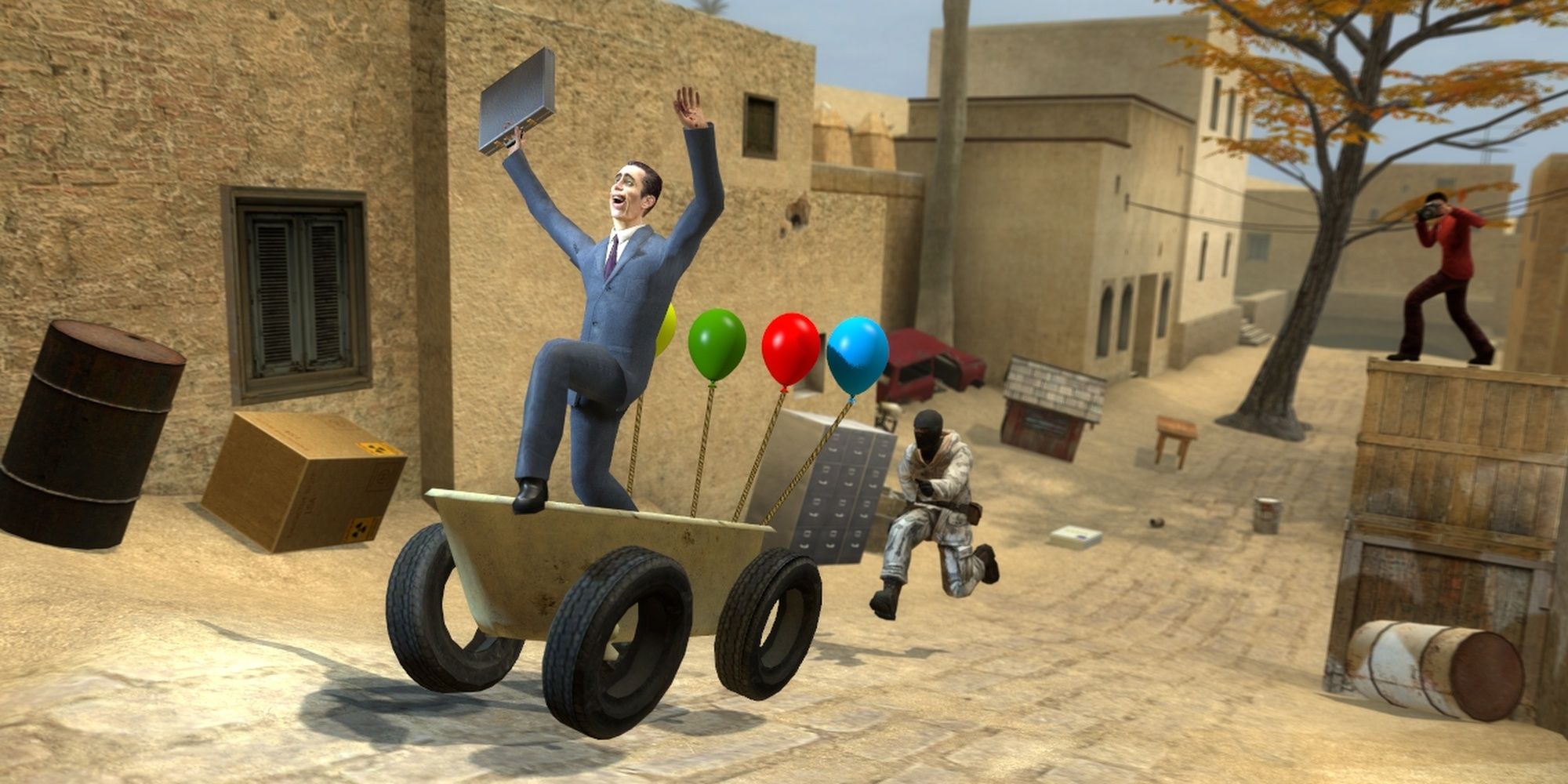 Garry's Mod a suited man with a suitcase flailing his arms and screaming in a wagon as a masked person chases him