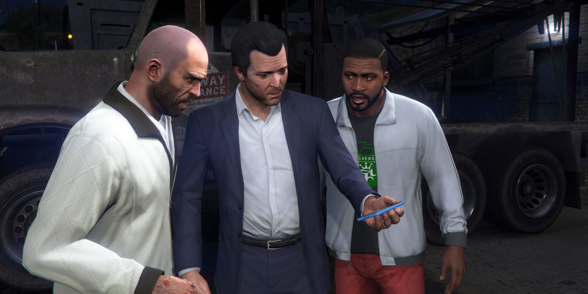 gta 5's trevor, michael, and franklin looking at a phone