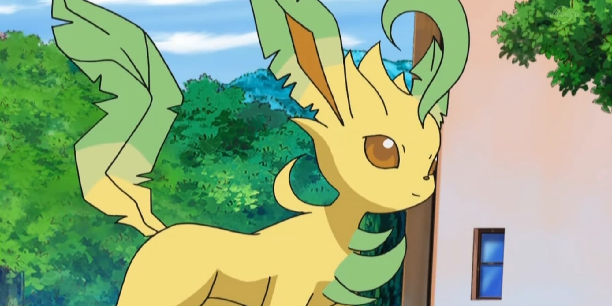 Zoey's Leafeon from the Pokemon anime stands proud in front of a building.