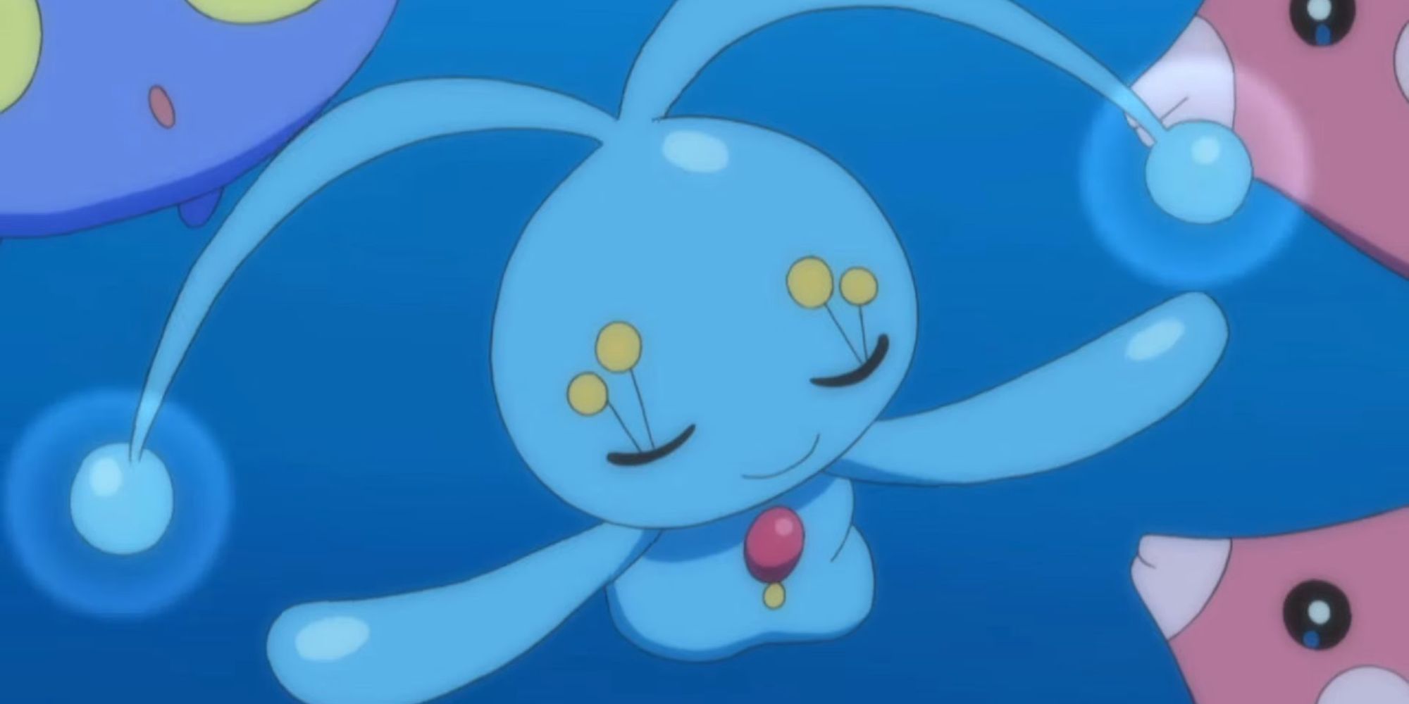 Manaphy floats in the water surrounded by Luvdisc and Chinchou