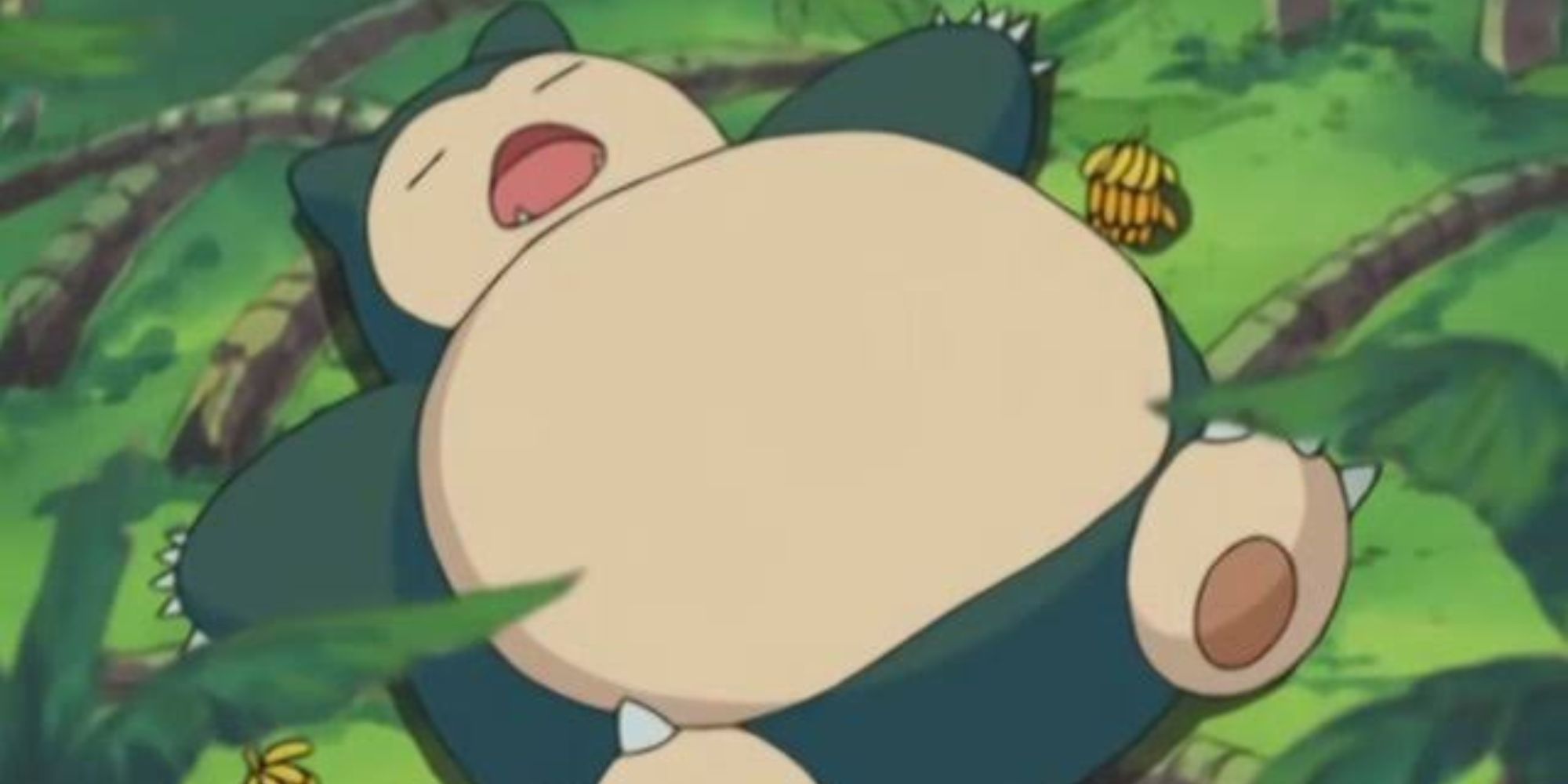 Snorlax rests on the ground in a forest surrounded by food in the Pokemon Anime.