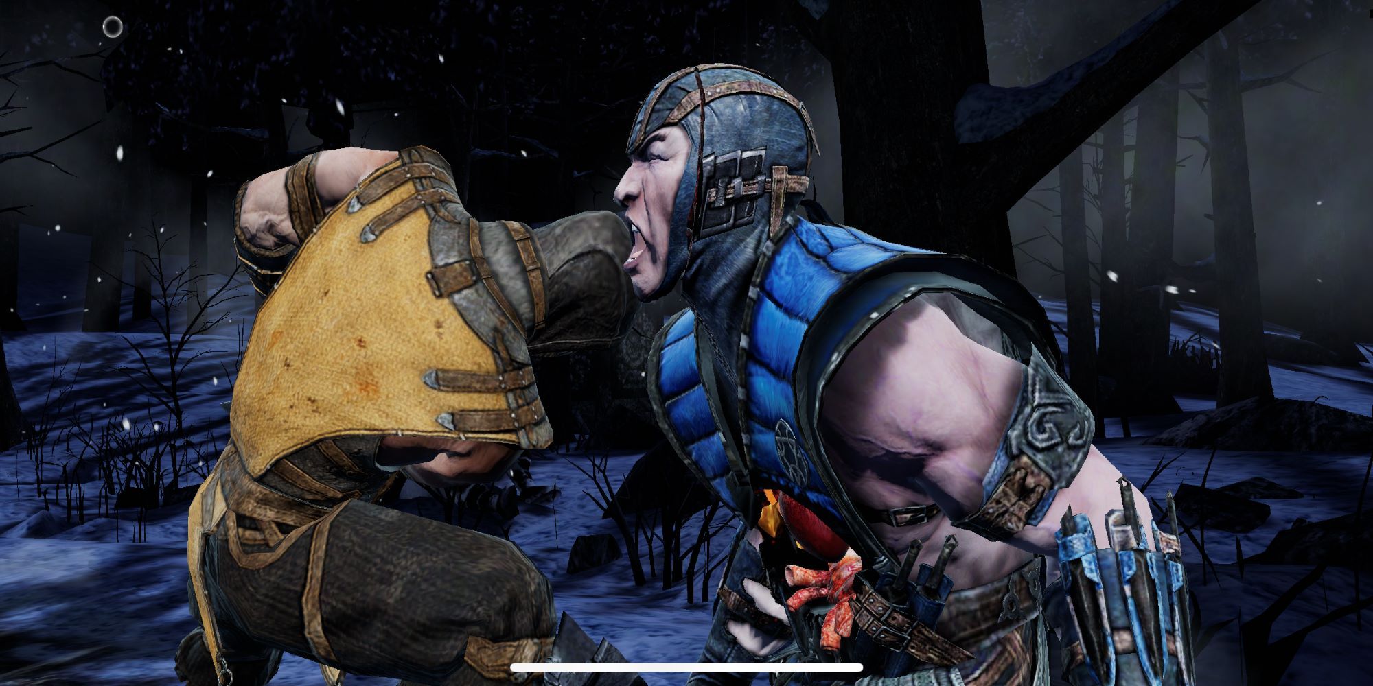 Scorpion rips a hole through Sub-Zero's chest during a battle inside a dark forest in Mortal Kombat Mobile.