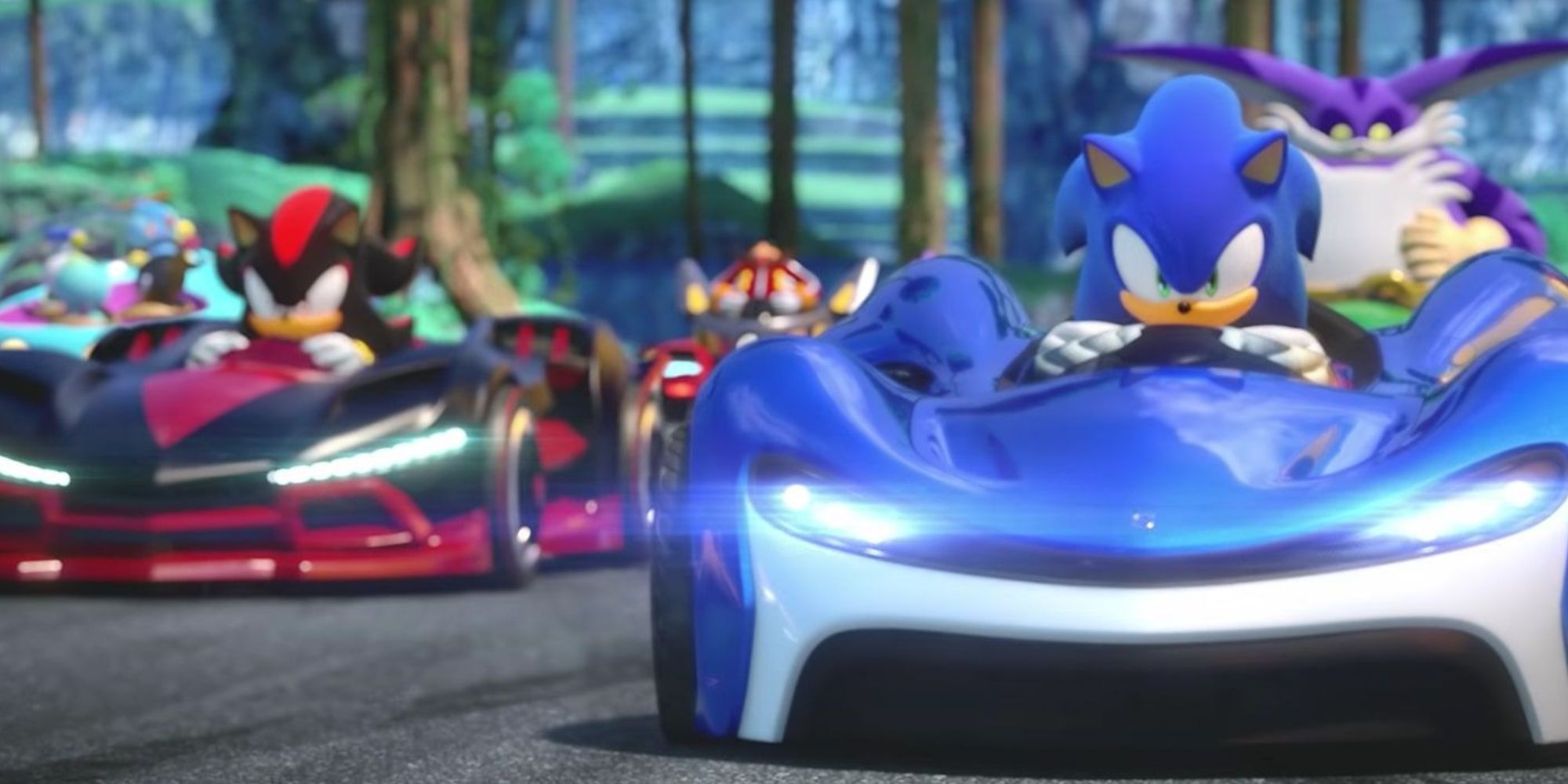 Sonice races down the road with Shadow and Big the Cat behind him