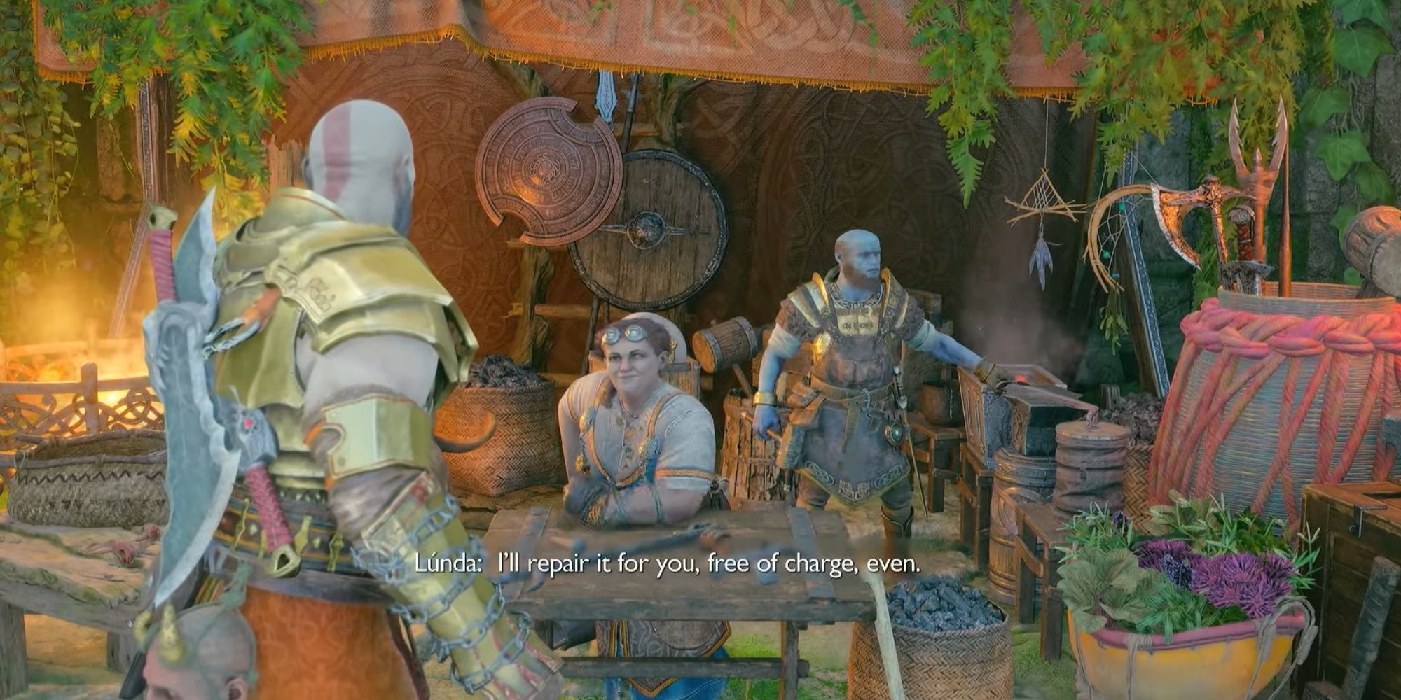 Kratos talking to Lunda about the armor she has asked him to find. Brok stands behind her working on armor.