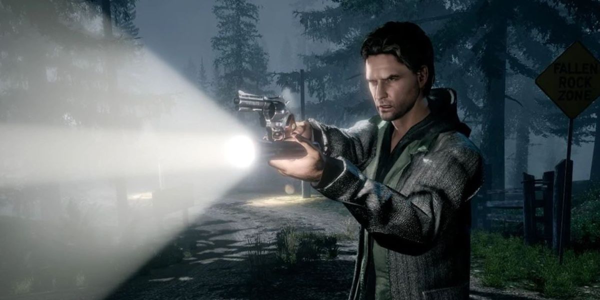 Alan Wake with a pistol and flashlight