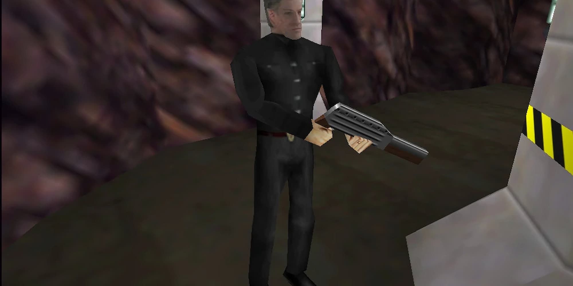 Alec Trevelyan stands in a military facility with a weapon.