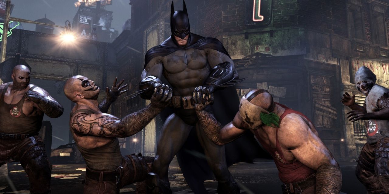 Batman fighting thugs in Arkham City