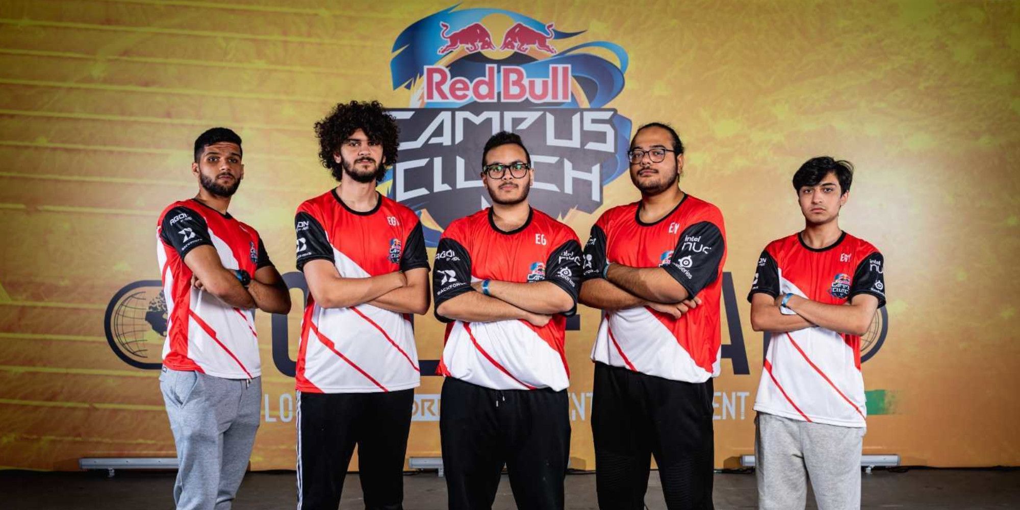 bravado team from egypt standing with arms folded in front of the red bull campus clutch logo