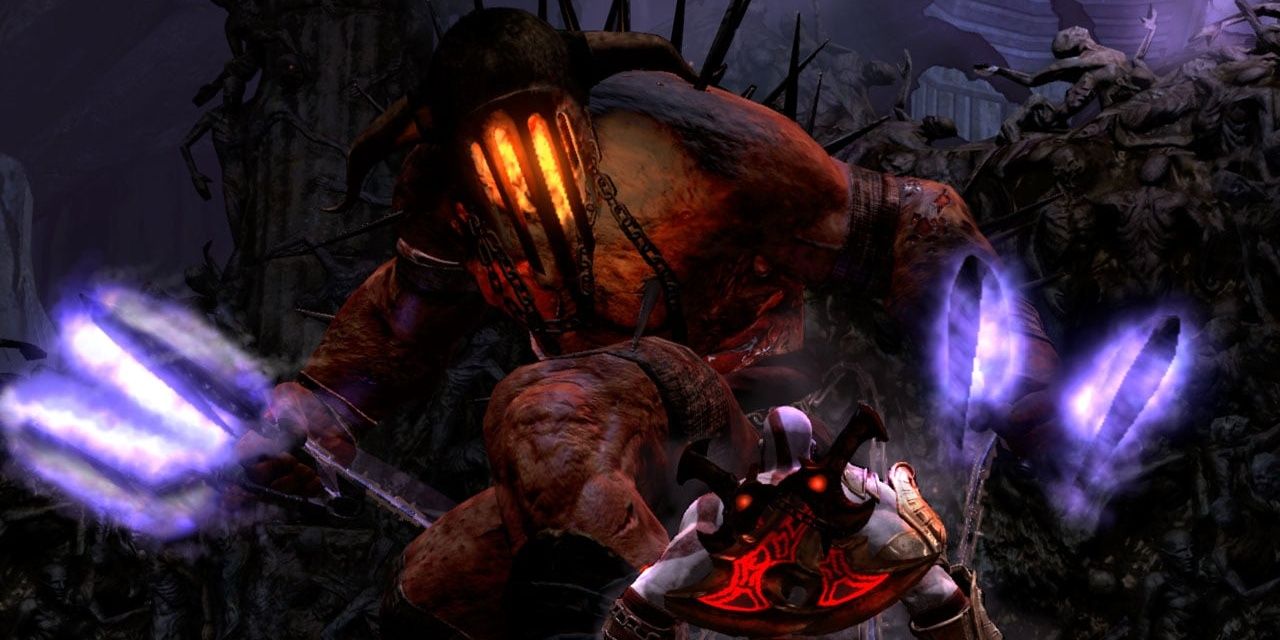 Hades and Kratos fighting, in God of War 3