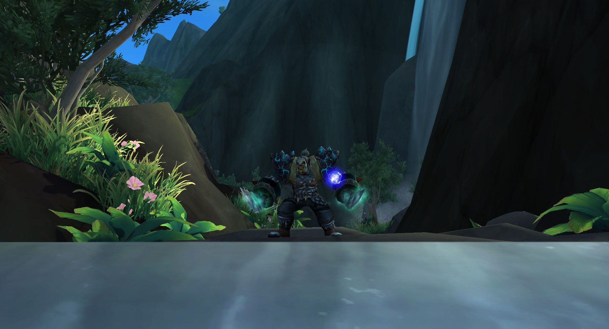 Enhancement Shaman with waterfall in background