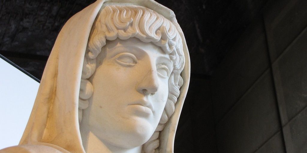 A closeup of the face of a statue of Hestia