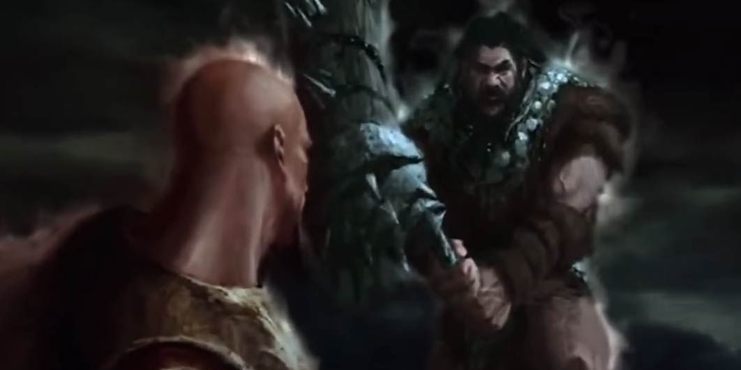 Kratos losing a battle against the Barbarian King, in God of War