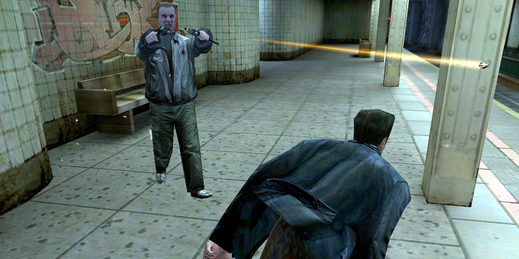 Max dodges a bullet in slow motion in Max Payne.