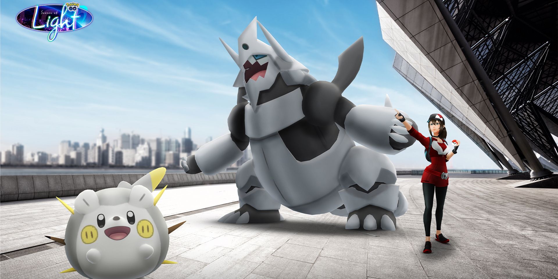 Image of Mega Aggron with Togedemaru and a Pokemon Trainer on either side of it