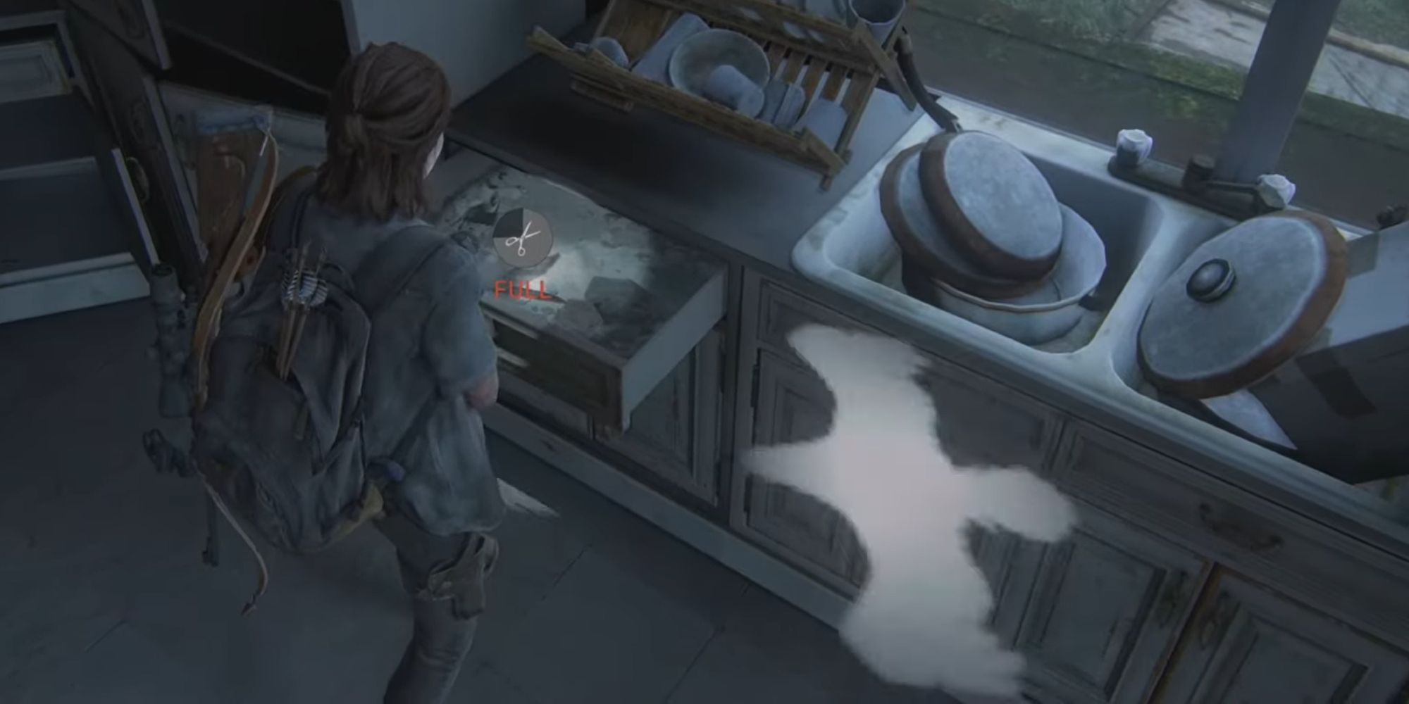 Ellie searching a draw with a phantom bird next to her