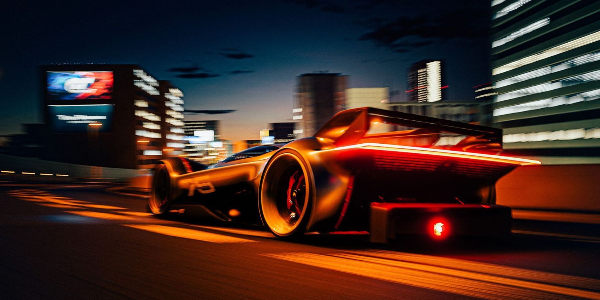 چشم انداز فراری در شبانه روزی از طریق شهری در Gran Turismo 7.