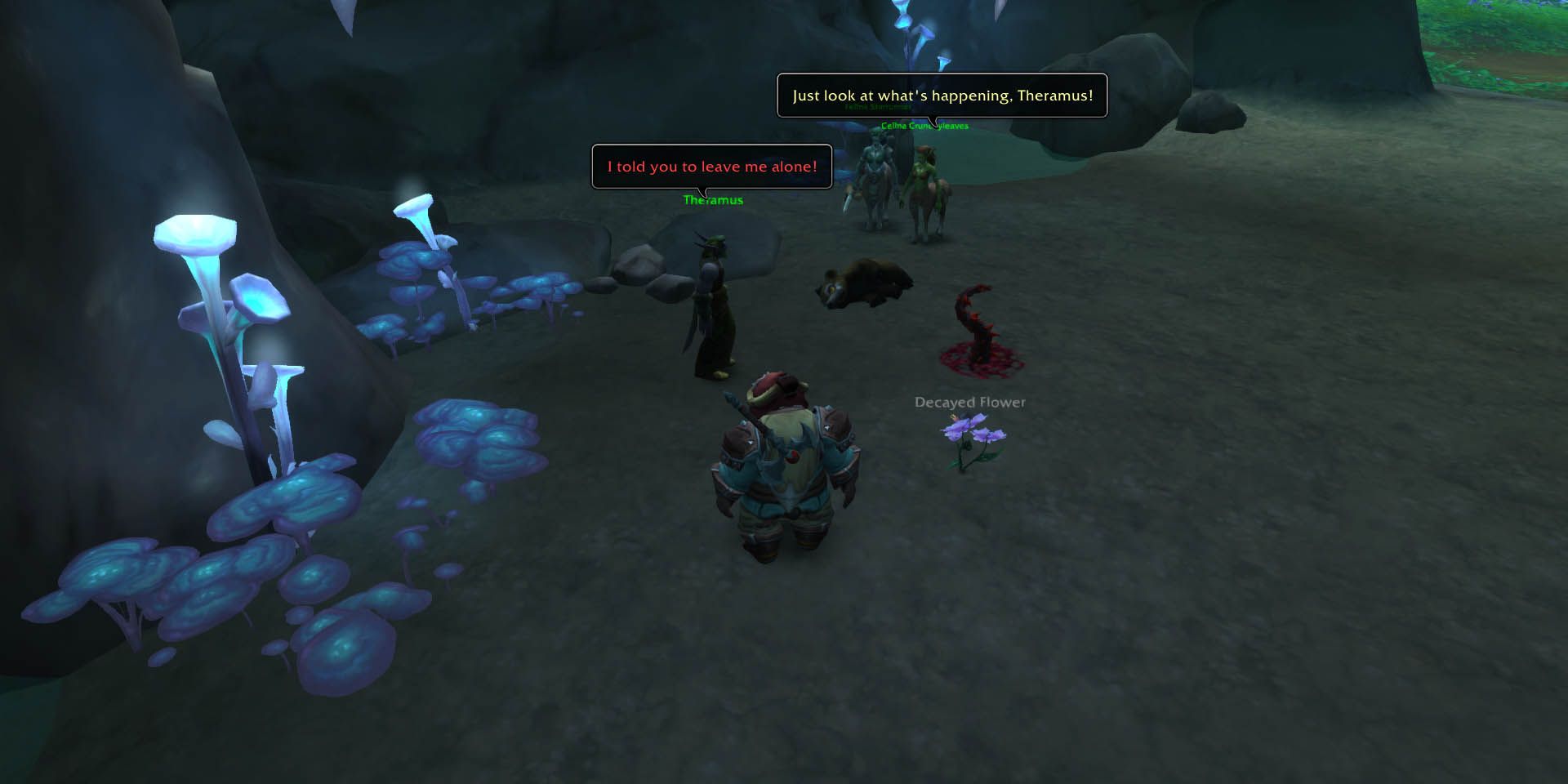 World of Warcraft: two dryads confronting a druid in a cave