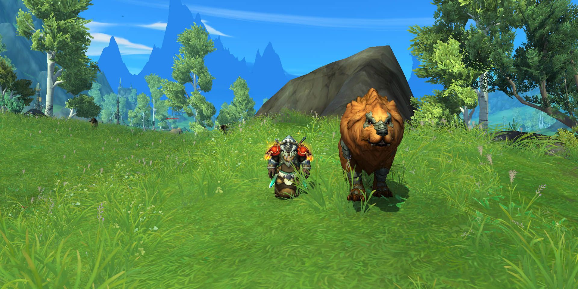 Wow: A pandaren monk standing in a field with a large animal