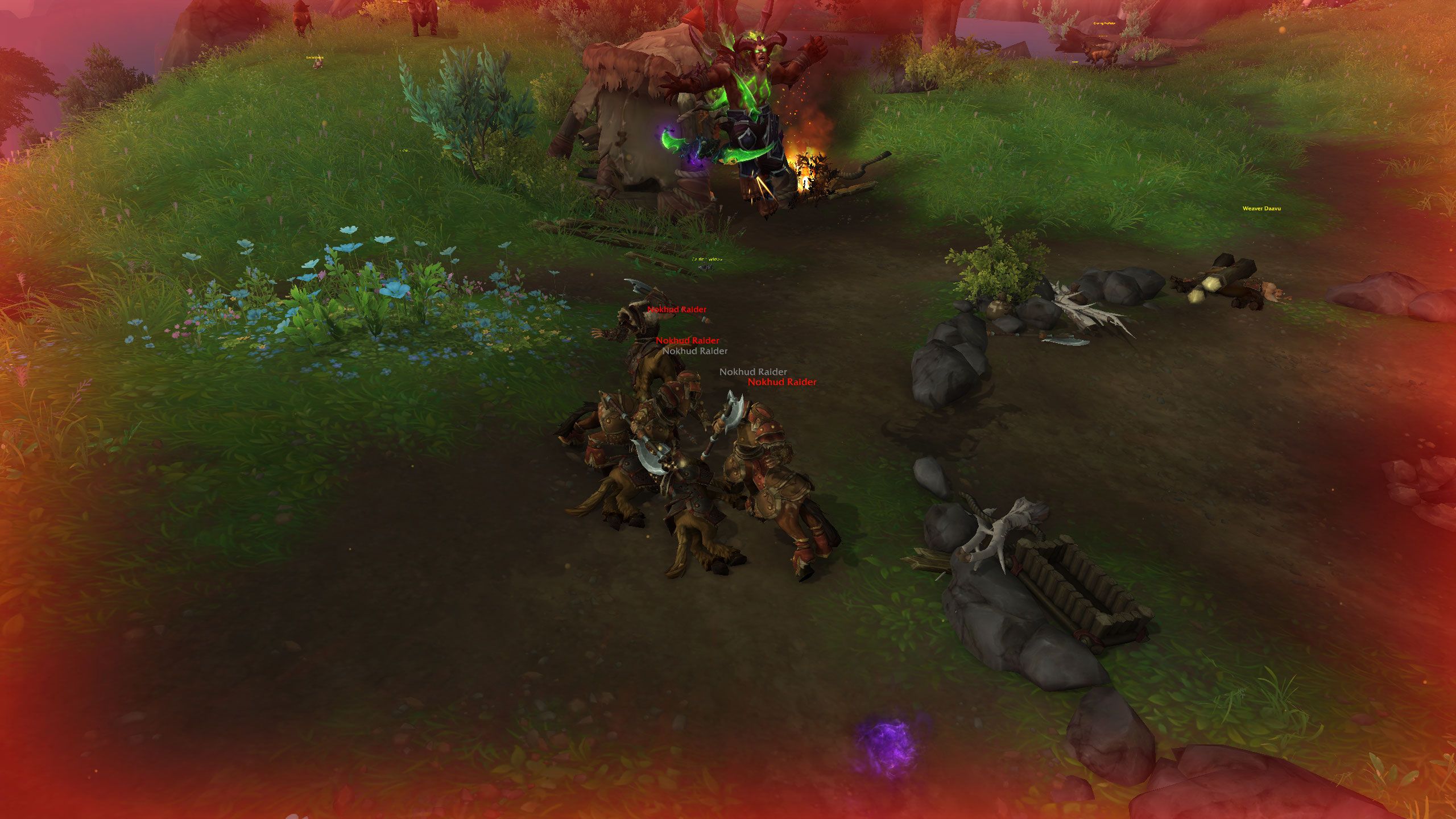 World of Warcraft Vengeance Demon Hunter leaping in the air with Infernal Strike onto centaurs
