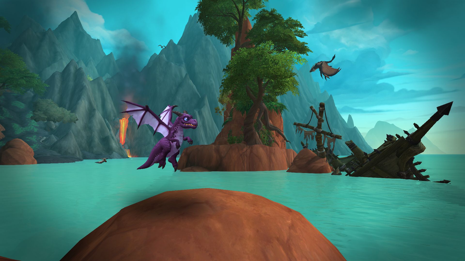 The purple whelp pet, Spyragos, beside a sunken ship in the Waking Shores.