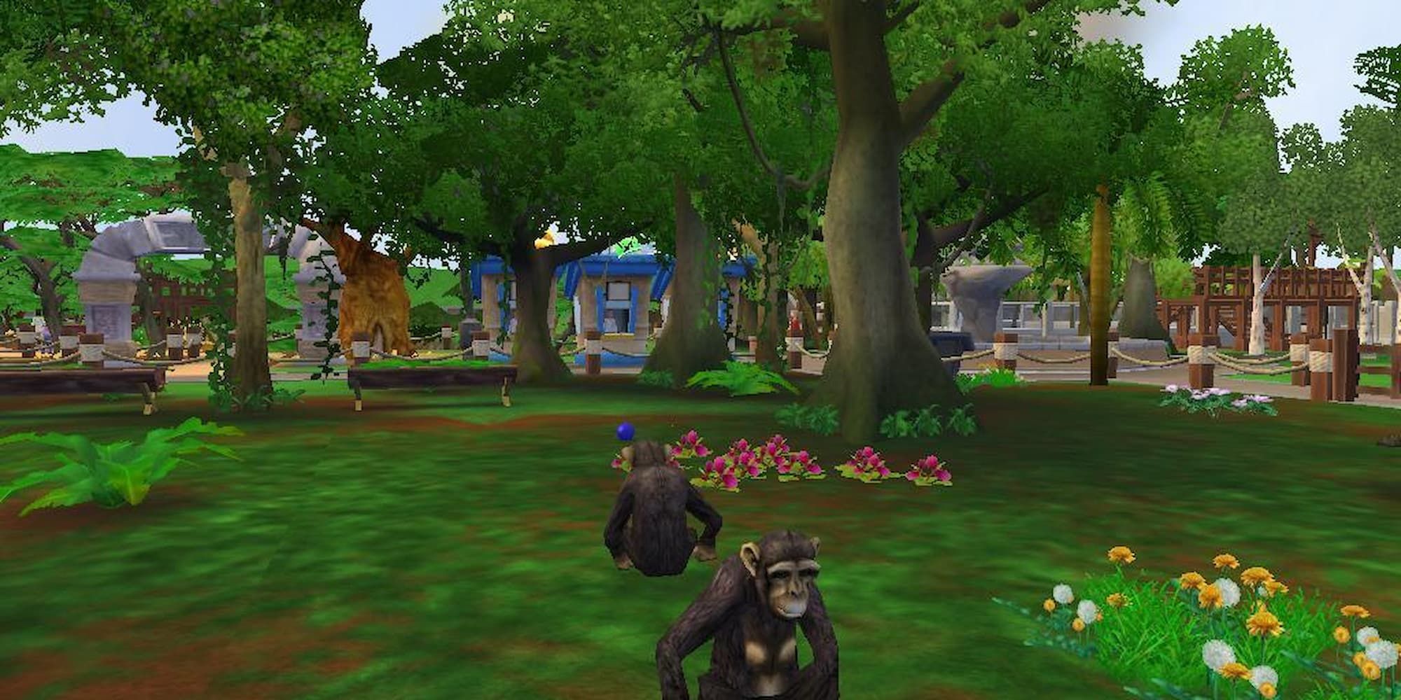 Chimpanzees sit in their exhibit in Zoo Tycoon 2.