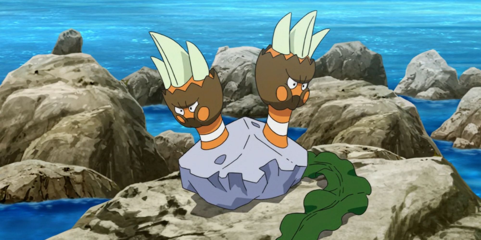 Binacle on rocky ocean shoreline in Pokemon Anime