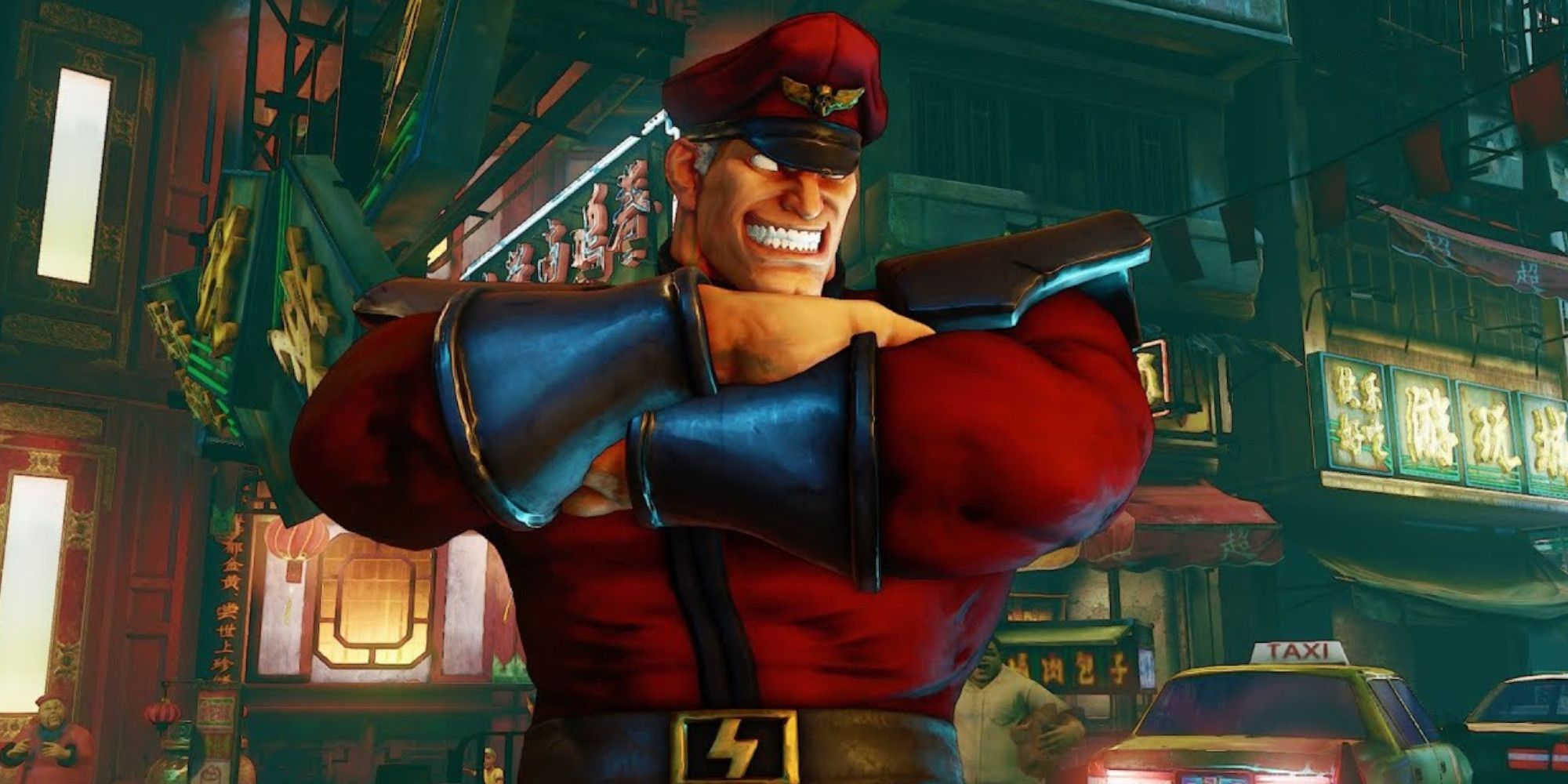 M. Bison grinning menacingly with crossed arms