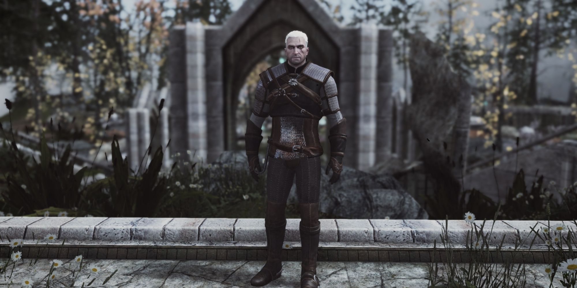 A screenshot of a character who looks like Geralt and wearing his armor in Skyrim